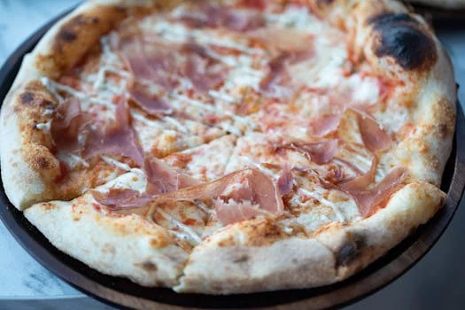 prosciutto pizza italian ham arugula parmesan